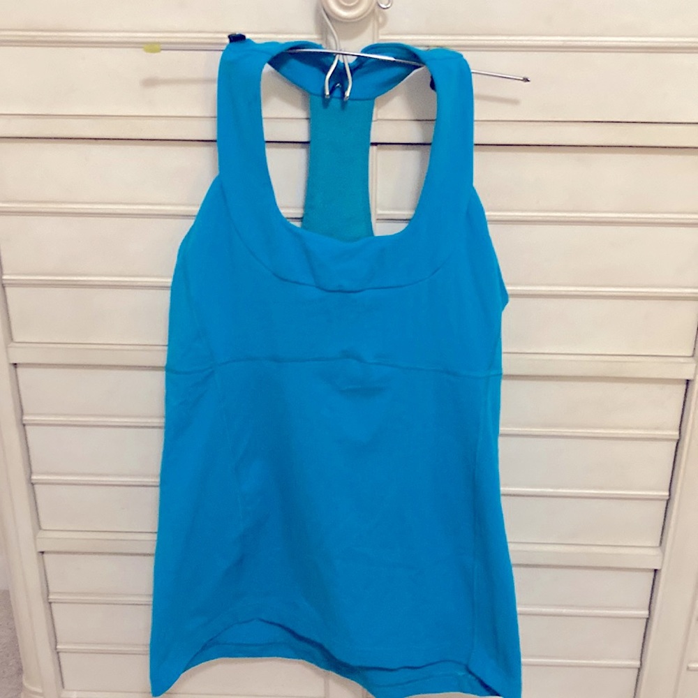 A lululemon sports tank with light to medium support in teal size 10
